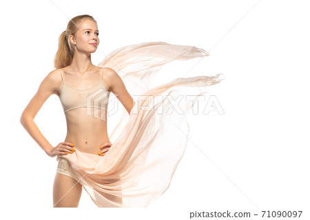 Beautiful woman in underwear isolated on white background. Beauty, cosmetics, spa, depilation, diet, treatment and fitness concept, sensual posing 71090097