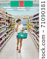 Woman with smartphone in store. grocery shopping. gadgets and shopping. 71090381