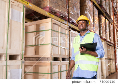 Portrait of African black warehouse worker Portrait of African black warehouse worker 71090530