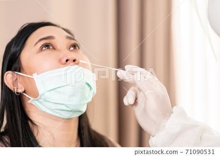 Medical staff do COVID-19 testing Medical staff do COVID-19 testing 71090531