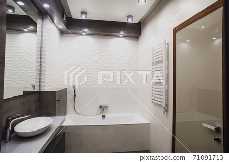 Modern bathroom in white and gray tones with mosaic on wide angle view Modern bathroom in white and gray tones with mosaic on wide angle view 71091713