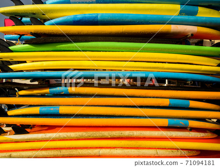 Stack of colorful surfboards Stack of colorful surfboards 71094181