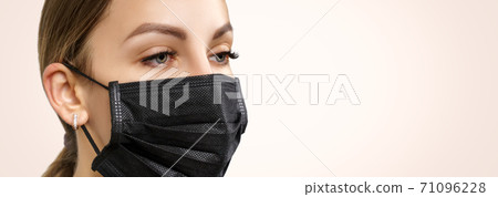 Eyelash Extension Procedure. Beautiful Woman with Extreme Long False Eyelashes. Makeup, Cosmetics. Beauty, Skincare. Woman in medical mask. Eyelash Extension Procedure. Beautiful Woman with Extreme Long False Eyelashes. Makeup, Cosmetics. Beauty, Skincare. Woman in medical mask. 71096228