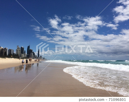 People walking along the Gold Coast coast People walking along the Gold Coast coast 71096801