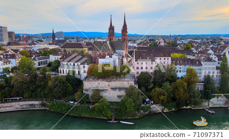 Flight over the city of Basel and River Rhine in Switzerland 71097371