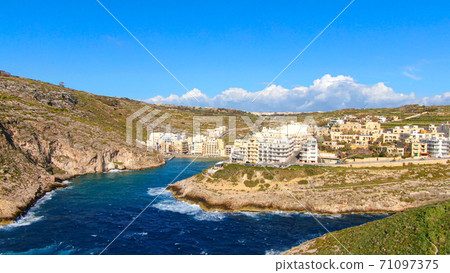 The village of Xlendi on the Island of Gozo from above - a popular place The village of Xlendi on the Island of Gozo from above - a popular place 71097375