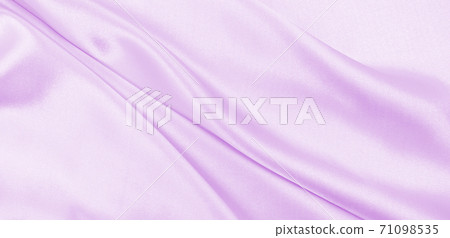 Smooth elegant lilac silk or satin texture as wedding background. Luxurious background design Smooth elegant lilac silk or satin texture as wedding background. Luxurious background design 71098535