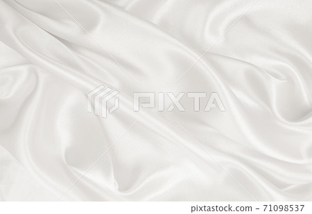 Smooth elegant golden silk or satin luxury cloth texture as wedding background. Luxurious background design. In Sepia toned. Retro style Smooth elegant golden silk or satin luxury cloth texture as wedding background. Luxurious background design. In Sepia toned. Retro style 71098537