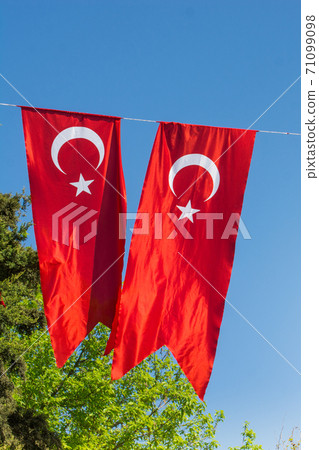 Turkish national flags hang in view in the open air Turkish national flags hang in view in the open air 71099098