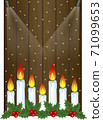 Creative frame made of Christmas wooden background with candles 71099653
