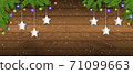 Christmas wooden background with branches and baubles 71099663