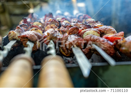 Skewers uncooked in nature on skewers in the open air. shashlyk 71100110