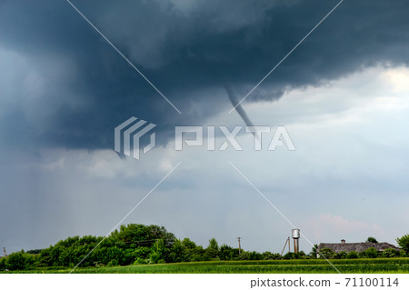Tornado atmospheric whirlwind in a cumulonimbus thundercloud 71100114