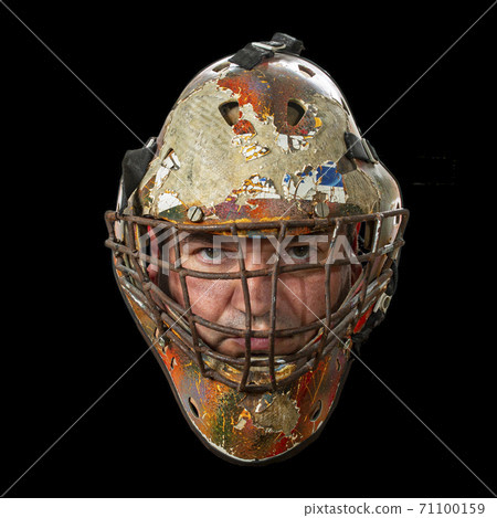 Mask. Portrait of a brutal man in a protective mask Mask. Portrait of a brutal man in a protective mask 71100159