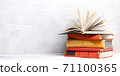 Books on wooden desk table and abstract background. Education background. Copy Space. Back to school. 71100365