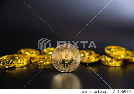 Bitcoin and gold coins Bitcoin and gold coins 71106929