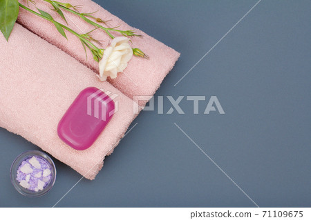 Spa products for facial and body care. Sea salt, soap and towel. 71109675