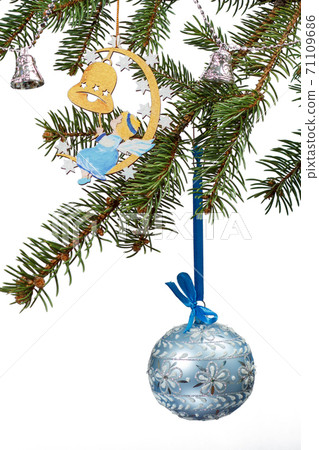Branches of natural fir tree with Christmas toys and ornament. Branches of natural fir tree with Christmas toys and ornament. 71109686