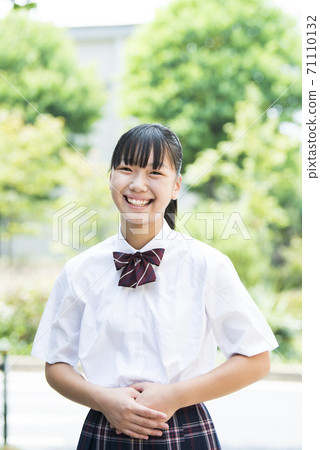 Junior high school girl, high school girl, portrait, looking at the camera Junior high school girl, high school girl, portrait, looking at the camera 71110132