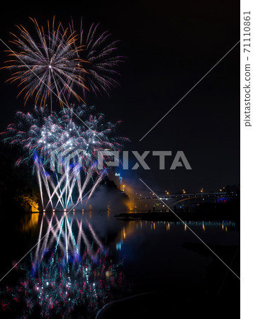 Dusk view of the Bitan Suspension Bridge with fireworks at Xindian District 71110861