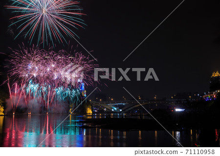 Dusk view of the Bitan Suspension Bridge with fireworks at Xindian District Dusk view of the Bitan Suspension Bridge with fireworks at Xindian District 71110958