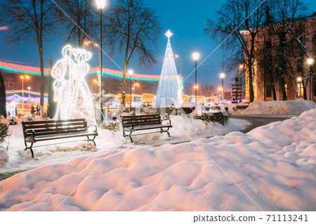 Christmas Tree And Festive Illumination On Lenin Square In Gomel. New Year In Belarus. Christmas Tree And Festive Illumination On Lenin Square In Gomel. New Year In Belarus. 71113241