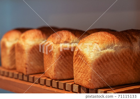 Freshly baked mountain-shaped bread Freshly baked mountain-shaped bread 71115133