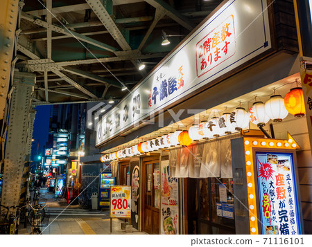 Night under the guard of the JR Loop Line in front of Osaka Tenma Station Night under the guard of the JR Loop Line in front of Osaka Tenma Station 71116101