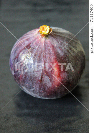 Large purple Fig close-up .Texture or background Large purple Fig close-up .Texture or background 71117409