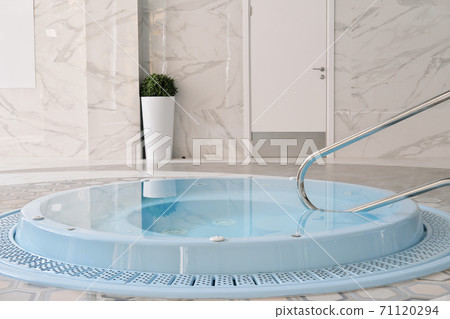 luxury spa center with whirpool or jacuzzi bathtube. luxury spa center with whirpool or jacuzzi bathtube. 71120294