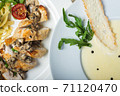 Top view of a restaurant table served with a multi-course set lunch and drink. Complex lunch. 71120470