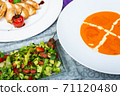 Top view of a restaurant table served with a multi-course set lunch and drink. Complex lunch. 71120480