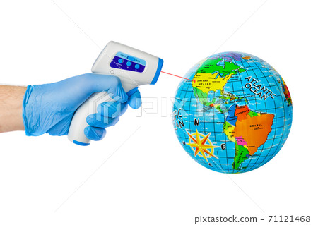 Hand with infrared thermometer and globe Hand with infrared thermometer and globe 71121468