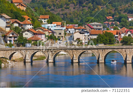 Old Bridge on Drina river in Visegrad - Bosnia and Herzegovina 71122351