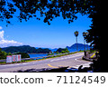 Midsummer coastal street 71124549
