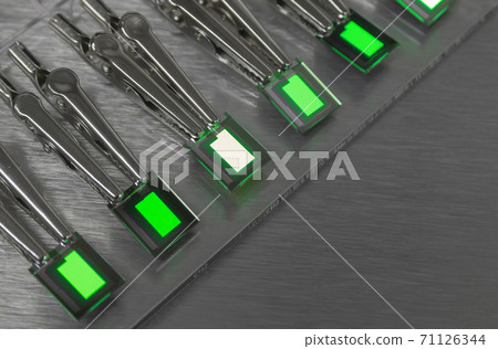 Small Creen color oled displays is lighting on a probe station. Lighting display technology. 71126344
