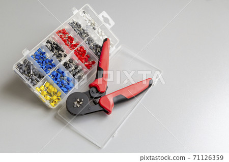 Tool and materials for stripping and crimping the tips of stranded electrical wires. 71126359