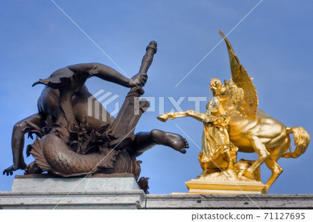 Statues on the columns of the Alexander III bridge 71127695