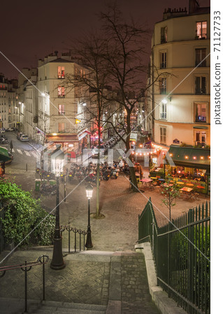 Square on the rue Maurice Utrillo at night Square on the rue Maurice Utrillo at night 71127733