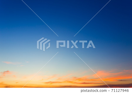 blue bright dramatic sunset sky in countryside or beach colorful cloudscape texture air background. 71127946