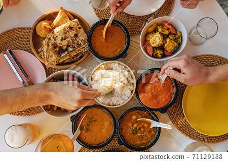 Selection of Indian curries and rice. 71129188