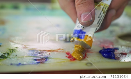 Artist copyist paint seascape with ship in ocean. Craftsman decorator draw as boat sail on blue sea with acrylic oil color. Draw finger brush palette. 71131084