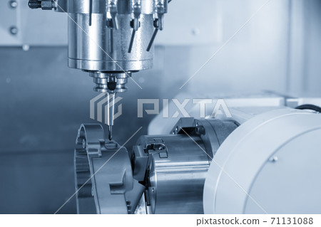 4-axis CNC machining center cutting the automotive parts. 4-axis CNC machining center cutting the automotive parts. 71131088