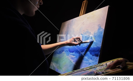 Artist copyist paint seascape with ship in ocean. Craftsman decorator draw as boat sail on blue sea with acrylic oil color. 71131806