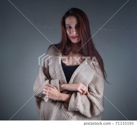 Shot of young woman with long hair in shadows 71133193