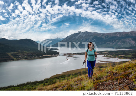 Adventurous Girl Hiking up the Nares Mountain 71133962