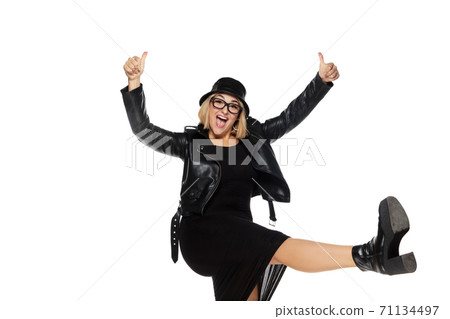 Beautiful young woman in black attire, stylish outfit isolated on white studio background 71134497