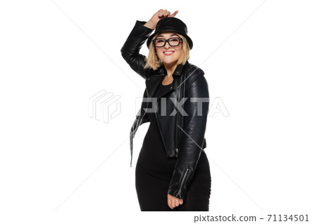 Beautiful young woman in black attire, stylish outfit isolated on white studio background 71134501