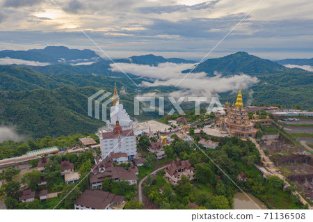 Aerial view of Wat Phra Thart Pha Sorn Kaew Statue temple, Phetchabun, Thailand. Nature landscape background. Travel trip on holiday and vacation. Thai tourist attraction. Aerial view of Wat Phra Thart Pha Sorn Kaew Statue temple, Phetchabun, Thailand. Nature landscape background. Travel trip on holiday and vacation. Thai tourist attraction. 71136508