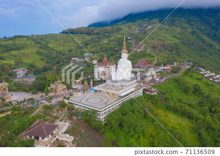 Aerial view of Wat Phra Thart Pha Sorn Kaew Statue temple, Phetchabun, Thailand. Nature landscape background. Travel trip on holiday and vacation. Thai tourist attraction. Aerial view of Wat Phra Thart Pha Sorn Kaew Statue temple, Phetchabun, Thailand. Nature landscape background. Travel trip on holiday and vacation. Thai tourist attraction. 71136509